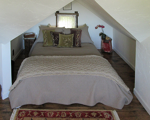 A guest suite in a converted attic in a Craftsman residence in the town of Martinez, CA which feels like a 200 year old Swiss Chalet inside.